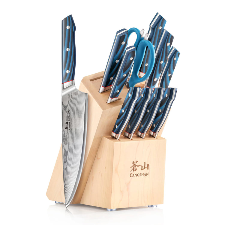 12-piece knife block set with blue handles, including knives and kitchen scissors, in a light maple wood block.