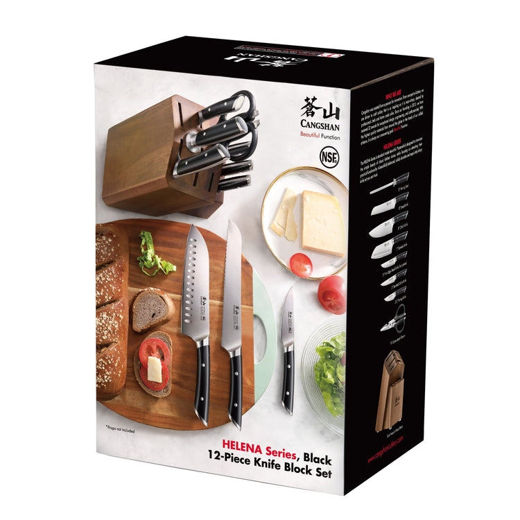 12-piece knife set with black handles in an acacia wood block, displayed with sliced bread and vegetables on a cutting board.