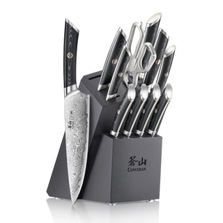 
                    
                      12-piece knife set with patterned blades, black handles, scissors, and a black angled wooden block with logo.
                    
                  