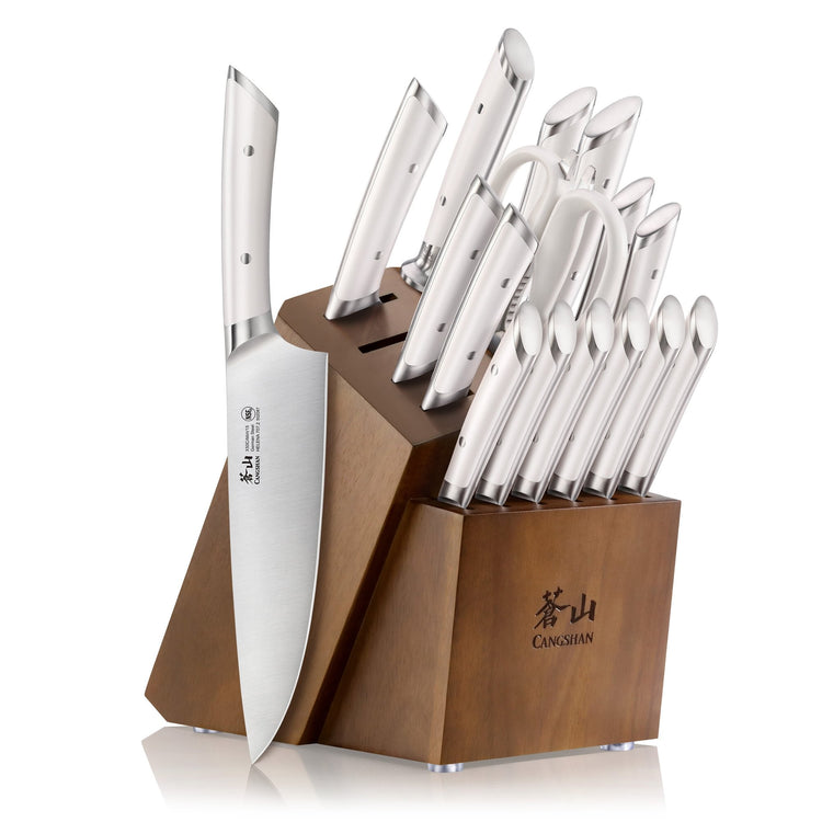 17-piece knife set with stainless steel blades and white handles in a wooden acacia block with knife slots.