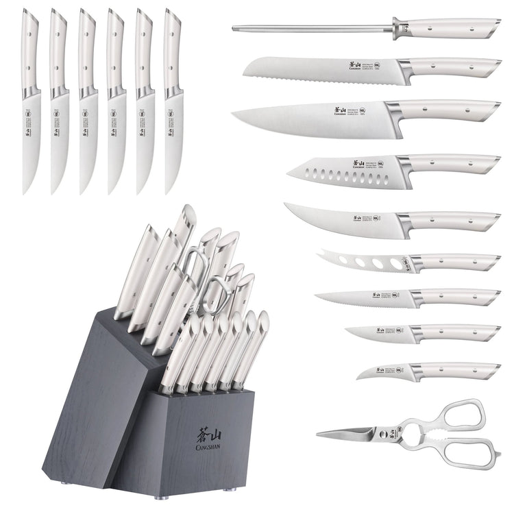 17-piece knife set with white handles, including various knives, kitchen shears, and a black angled wood block.
