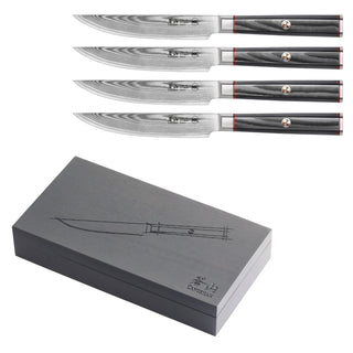 
                    
                      Four steak knives with patterned Damascus steel blades and dark handles, displayed above a closed dark wood storage box.
                    
                  
