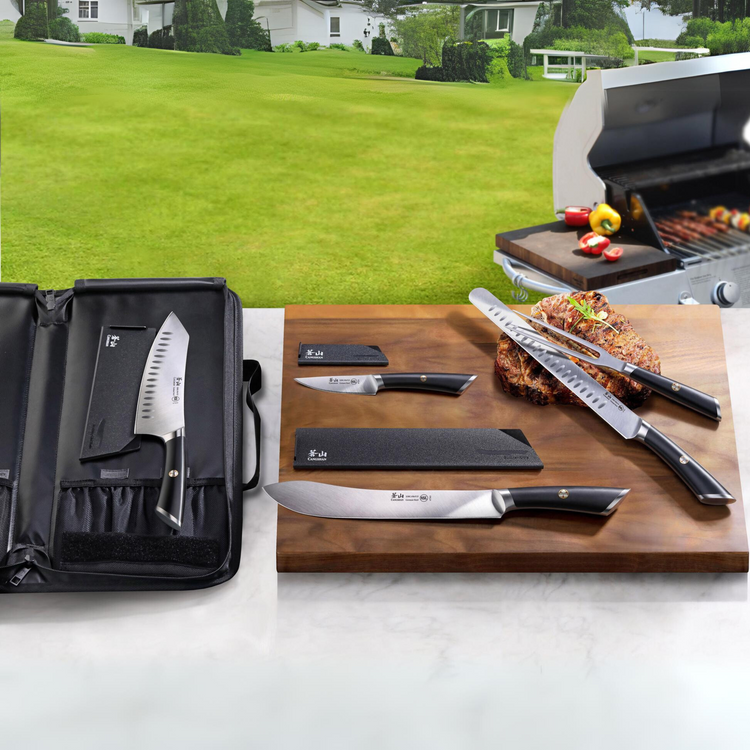 Six-piece BBQ knife set with black handles displayed on a wooden board and in a black carrying case, near a grill.