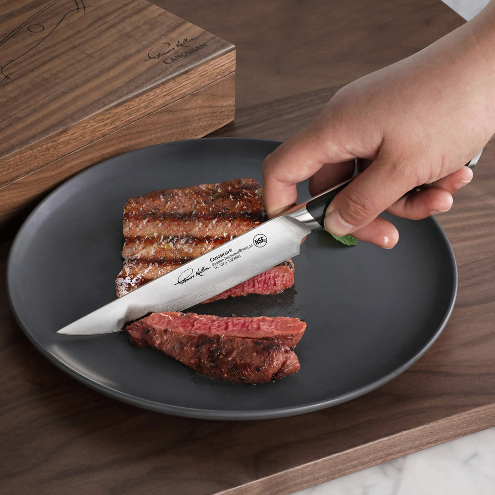 
                  
                    Load image into Gallery viewer, TKSC 4-Piece 5-Inch Steak Knife Set, Forged Swedish Powder Steel, Thomas Keller Signature Collection, Black, w/Walnut Storage Box 1023893
                  
                