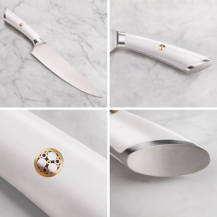 Chef knife with a white handle featuring a decorative circular emblem and a stainless steel blade on a marble surface.