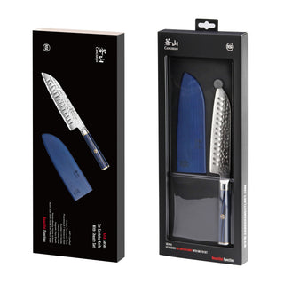 
                    
                      Santoku knife with hammered blade and blue sheath in black retail packaging.
                    
                  
