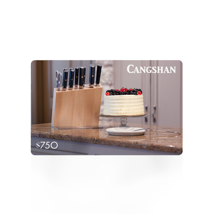 Cangshan $750 gift card depicting a knife block set and a berry-topped cake on a kitchen counter.