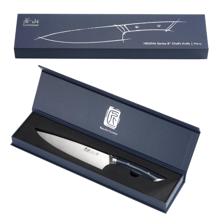 8-inch chef's knife with navy blue handle in open blue presentation box with matching closed lid above.