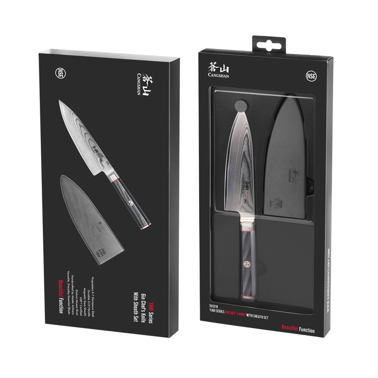 6-inch chef's knife with patterned Damascus steel blade and black sheath in black retail packaging.