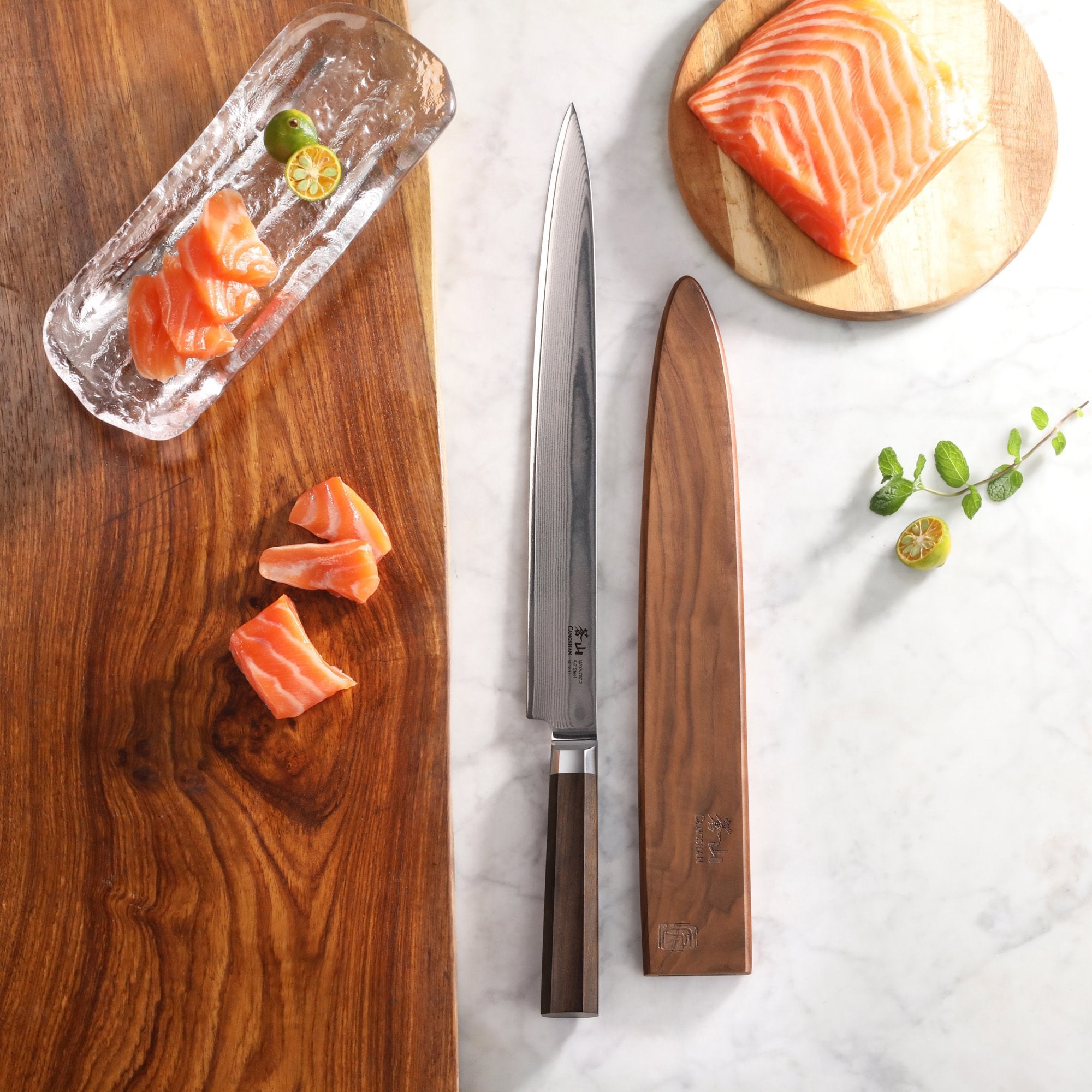 MAYA Series 12-Inch Sashimi Knife with Damascus steel blade, wooden sheath, and sliced salmon on a wooden board.