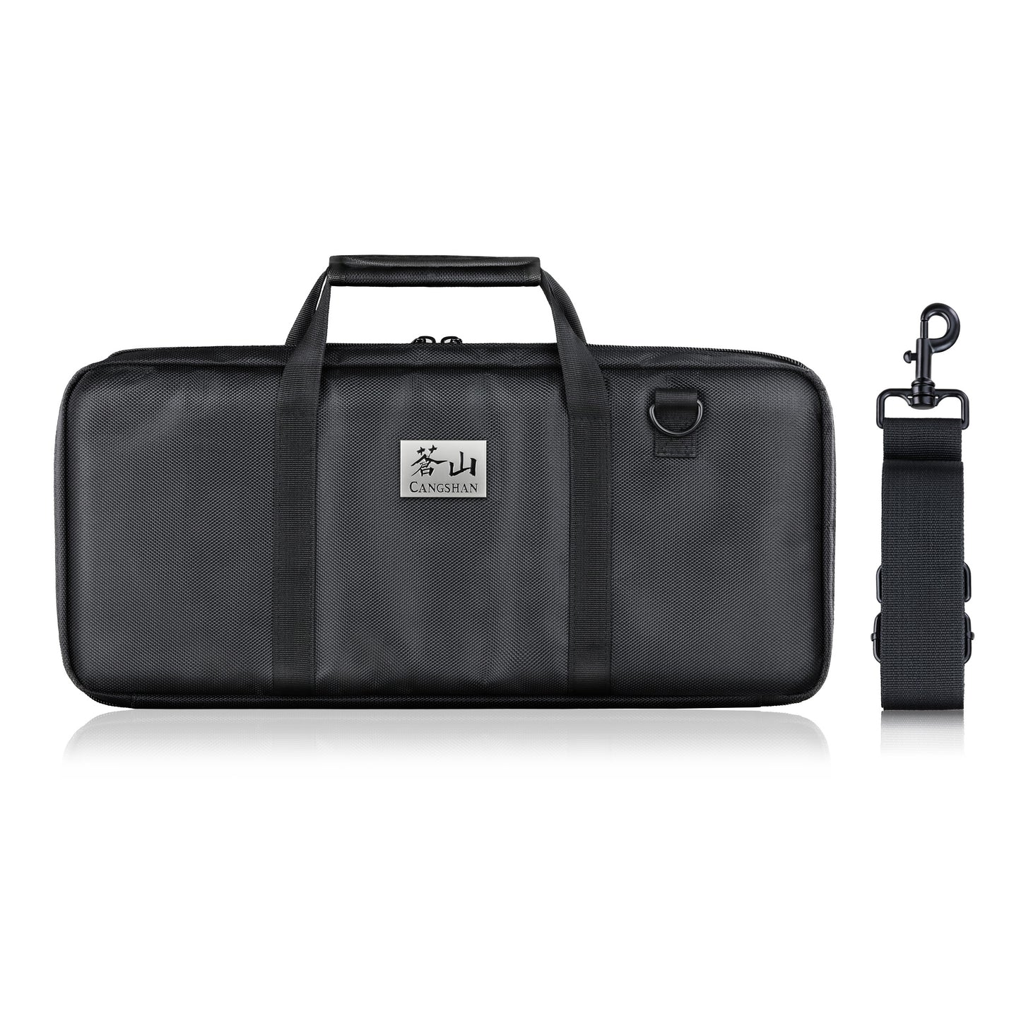 Black rectangular nylon knife bag with handles and detachable shoulder strap, closed and empty.