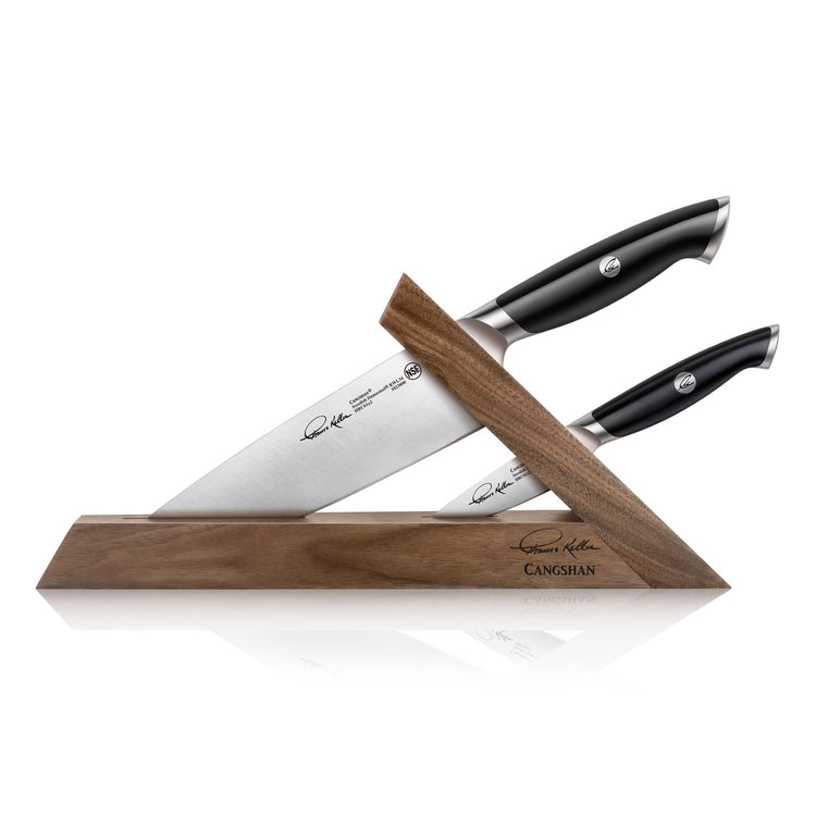 Three-piece knife block set with two black-handled knives in a wooden triangular stand.