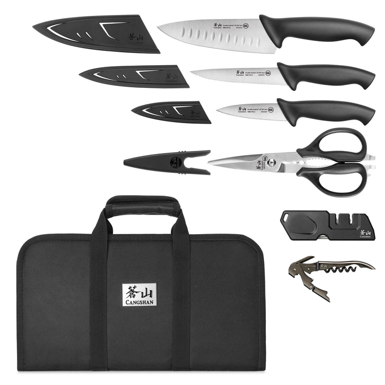 Seven-piece knife set with black handles, including three knives with blade covers, kitchen scissors, peeler, sharpener, cork