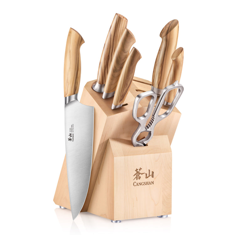 Knife block set with six knives, kitchen scissors, and a wooden block with natural maple finish.
