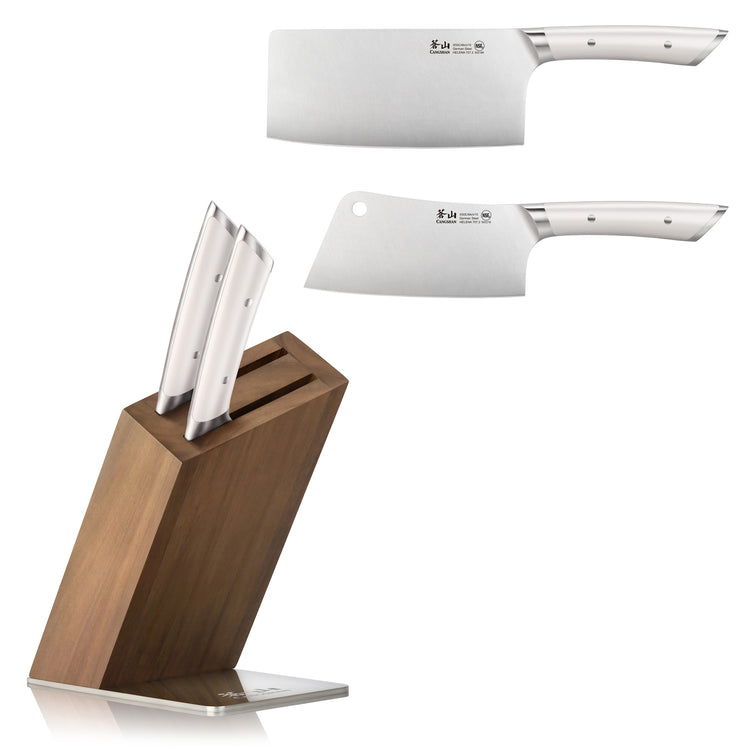 Two stainless steel cleaver knives with white handles and a wooden knife block with two knives inserted.