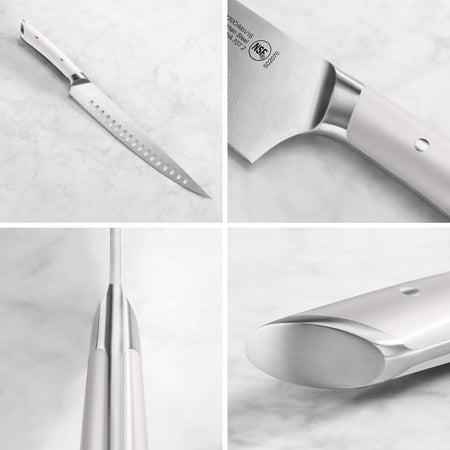 Stainless steel carving knife with white handle shown from multiple angles on a marble surface.