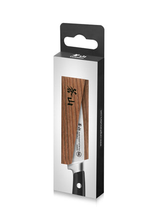 
                    
                      Solid ash wood magnetic knife sheath covering the blade of a kitchen knife with a black handle.
                    
                  