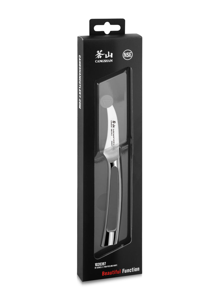 Peeling knife with curved blade and metal handle in black rectangular packaging with clear window.