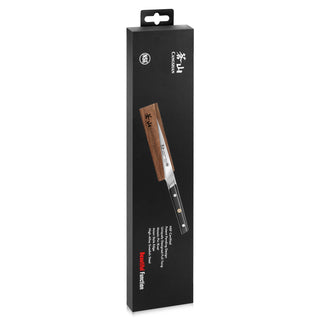 
                    
                      Chef's knife with wooden handle displayed on black rectangular packaging box.
                    
                  