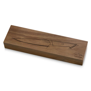 
                    
                      Wooden knife storage box with a simple line drawing of a utility knife on the lid.
                    
                  