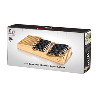 
                    
                      15-piece black knife set with bamboo in-drawer storage tray, arranged in two rows.
                    
                  