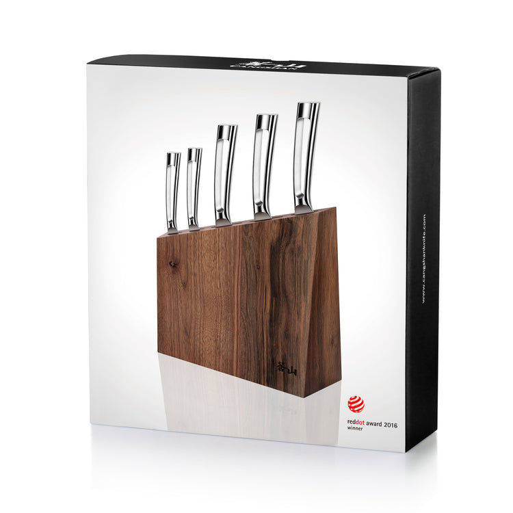 Walnut knife block holding five knives with polished metal handles, displayed on white background.